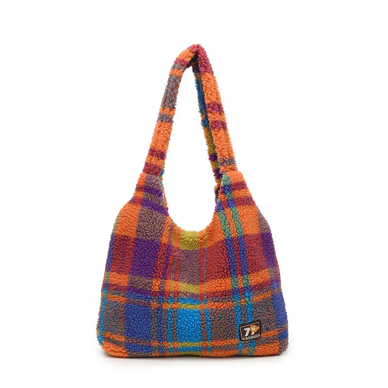Women's plaid plush crossbody tote bag showing large capacity interior with zipper compartments