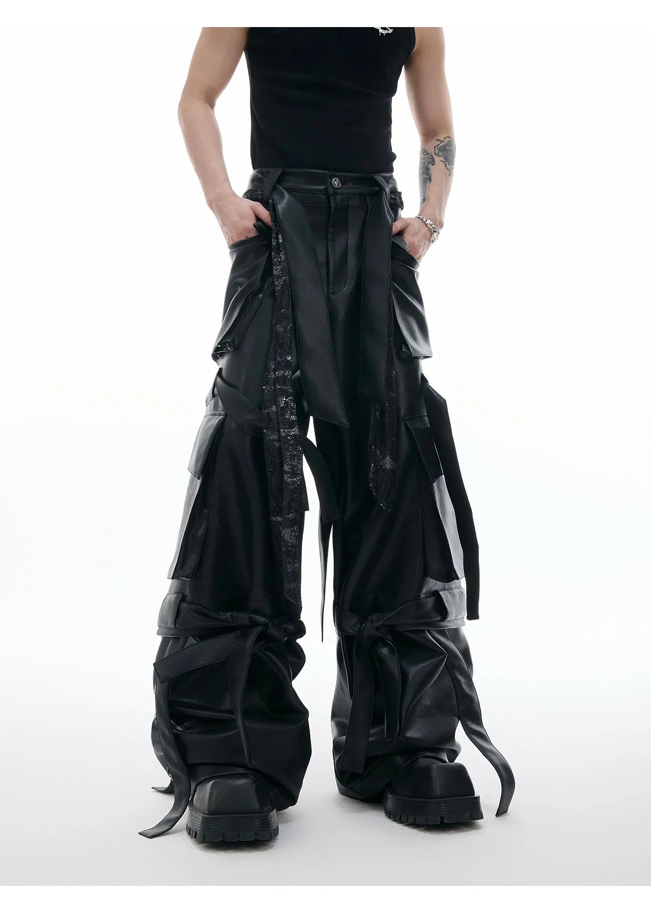 Black loose-fit multi-pocket trousers with quilted stitching detail.