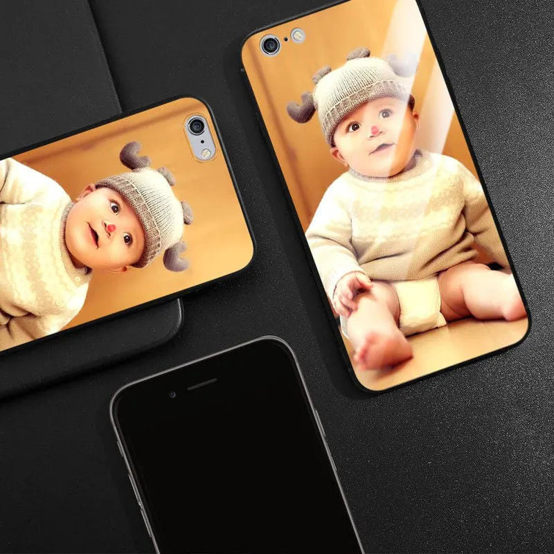 Patterned ultra-thin iPhone case with raised camera bumper edge on a table.