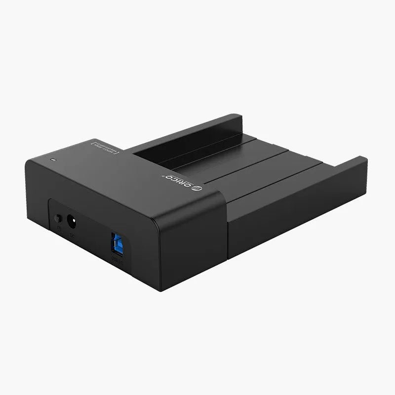 Black universal 2.5-inch and 3.5-inch SATA hard disk enclosure box with data cable.