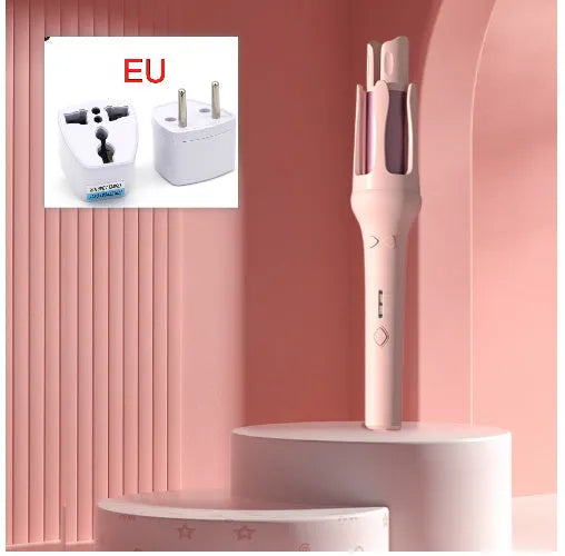 White and pink automatic hair curler with 32mm ceramic barrel and auto-clamp feature on a table.