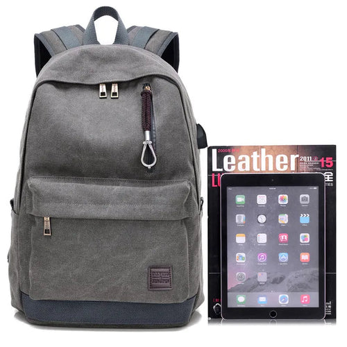 Canvas backpack with external USB charging port showing coffee colour option with multiple compartments.