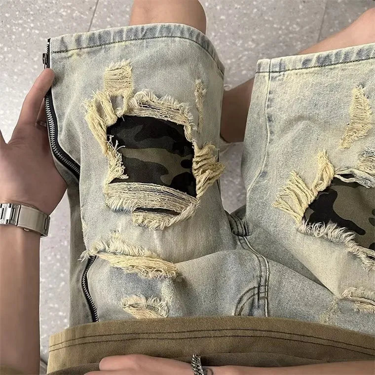 Men's yellow mud camouflage denim shorts with ripped detailing and straight leg cut