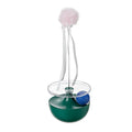 Self-congratulating stick tumbler cat toy in white HIPS+PC plastic on floor
