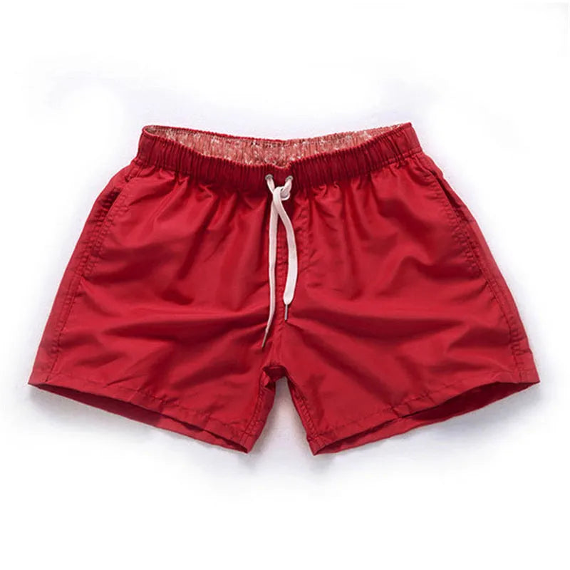 Men's straight leg polyester beach shorts in multiple colours with extended sizing options