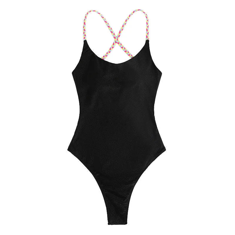 Black backless one-piece swimsuit for women on a mannequin, sleeveless design.