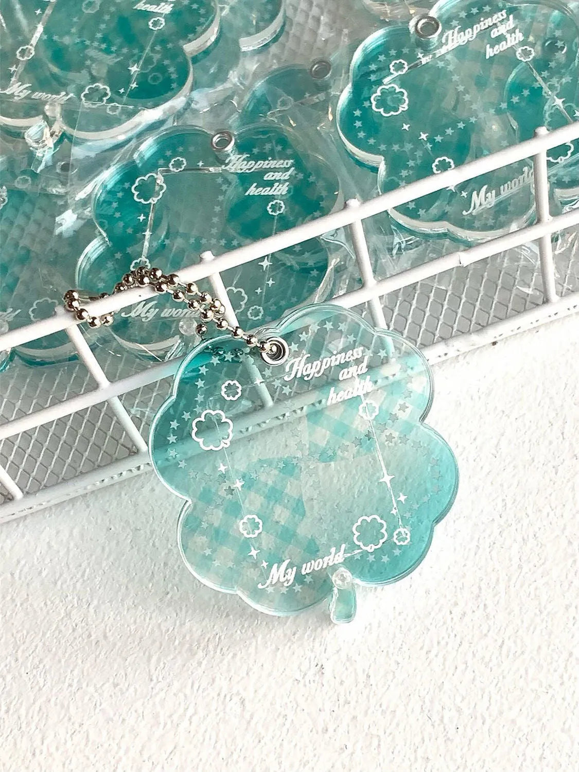 Acrylic four-leaf clover keychain pendant in blue, green, or mint green