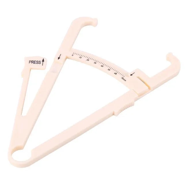 Compact acrylic fat caliper for body fat measurement, showing size and scale.