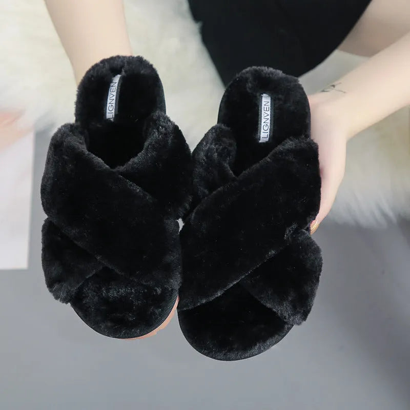 Cross open-toe fur slippers in black with a patterned non-slip rubber sole.