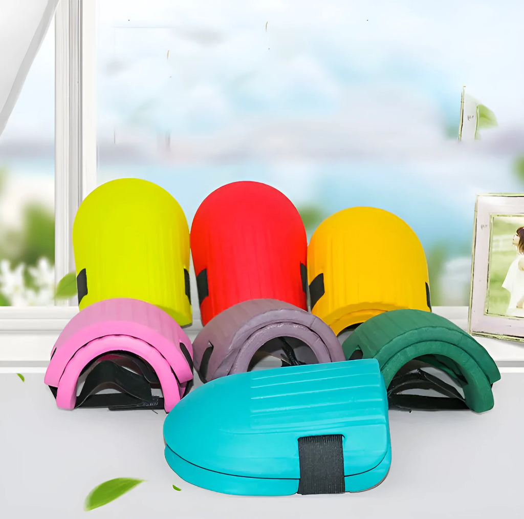A pair of rectangular EVA foam knee pads in army green colour on a garden soil background.