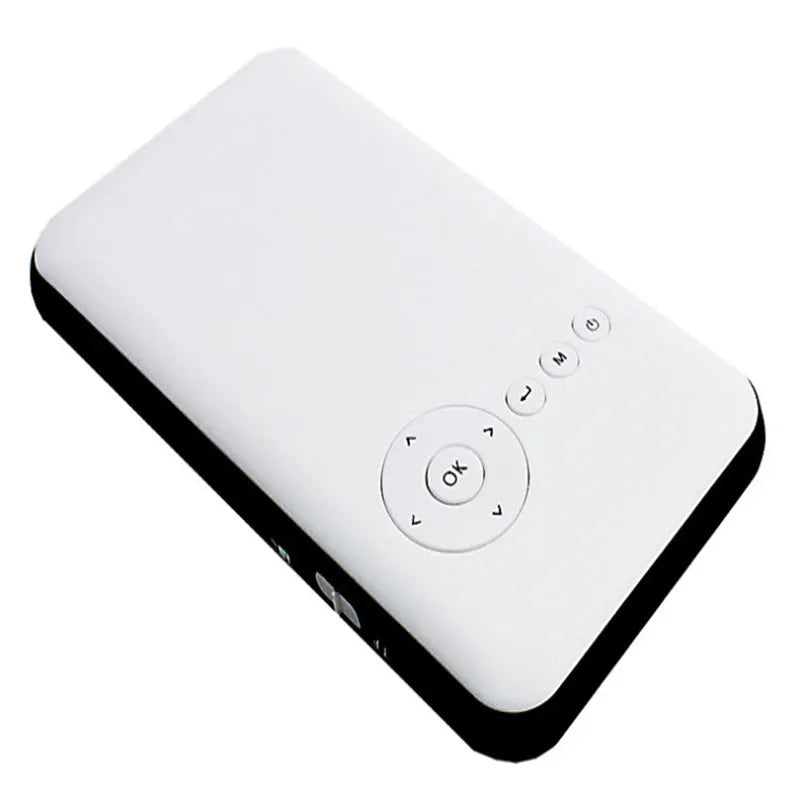 White smart handheld projector with Android system, DLP technology, wireless projection capability, placed on a table