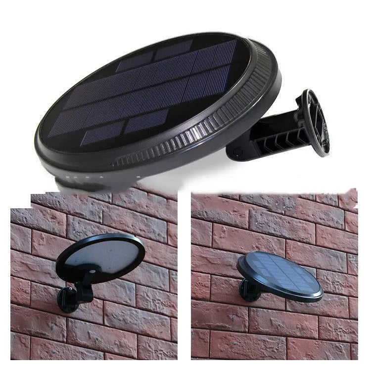 Black outdoor solar wall light with LED, IP65, for garden or pathway use