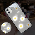 White TPU iPhone case with painted purple daisies and letters, showing voice-activated colour light feature.