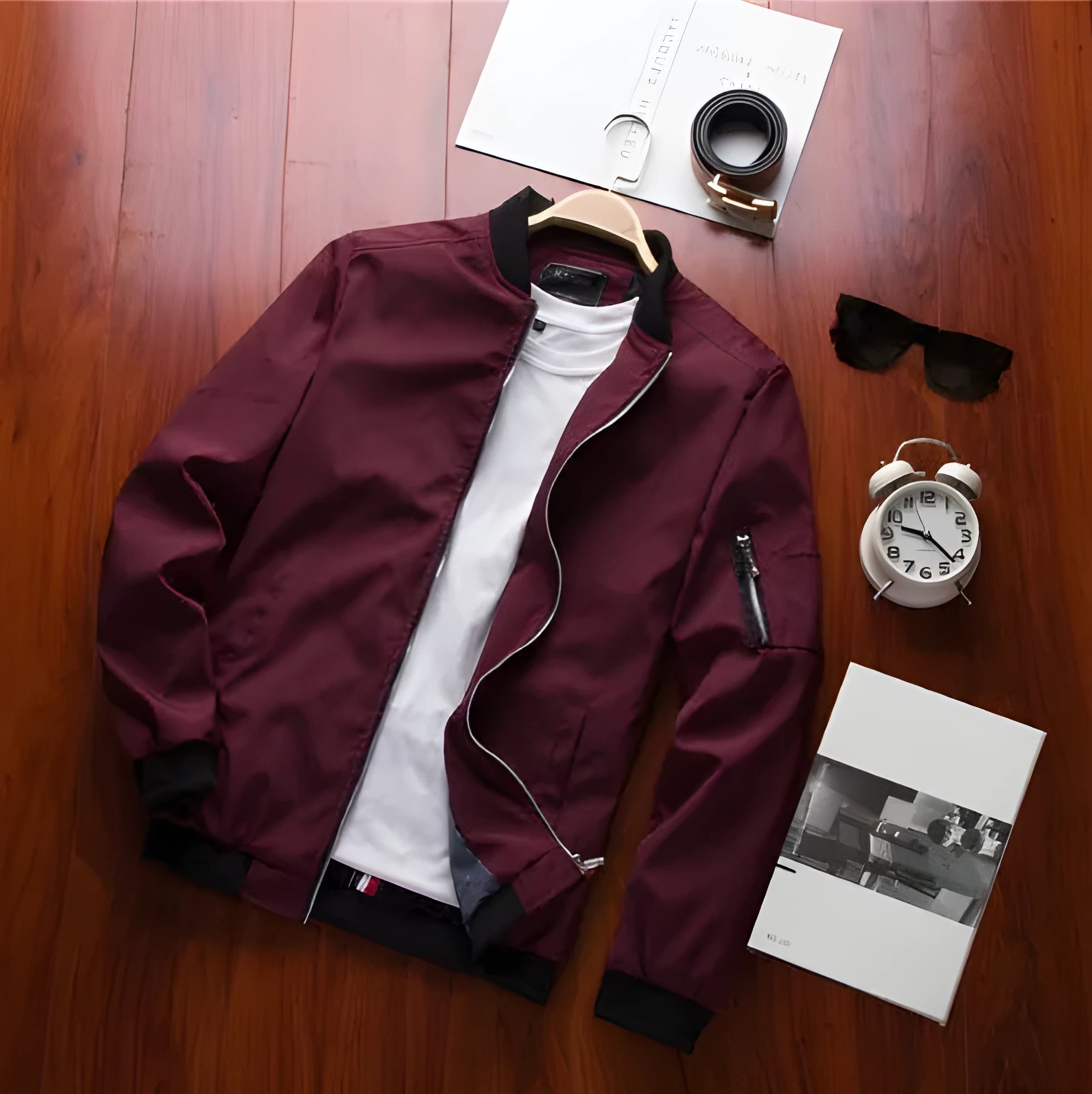Men's slim-fit casual baseball jacket with zippered side pockets in a solid colour.