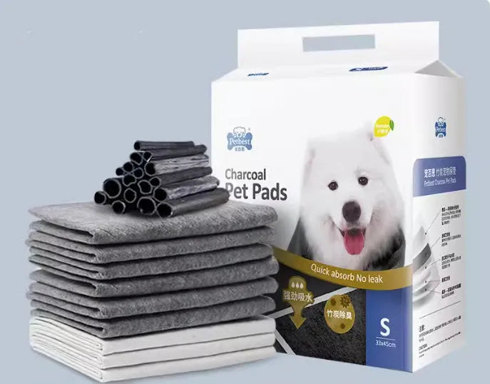 Pack of thickened adhesive dog urine pads showing bamboo charcoal deodorising variant in L size 60x60cm