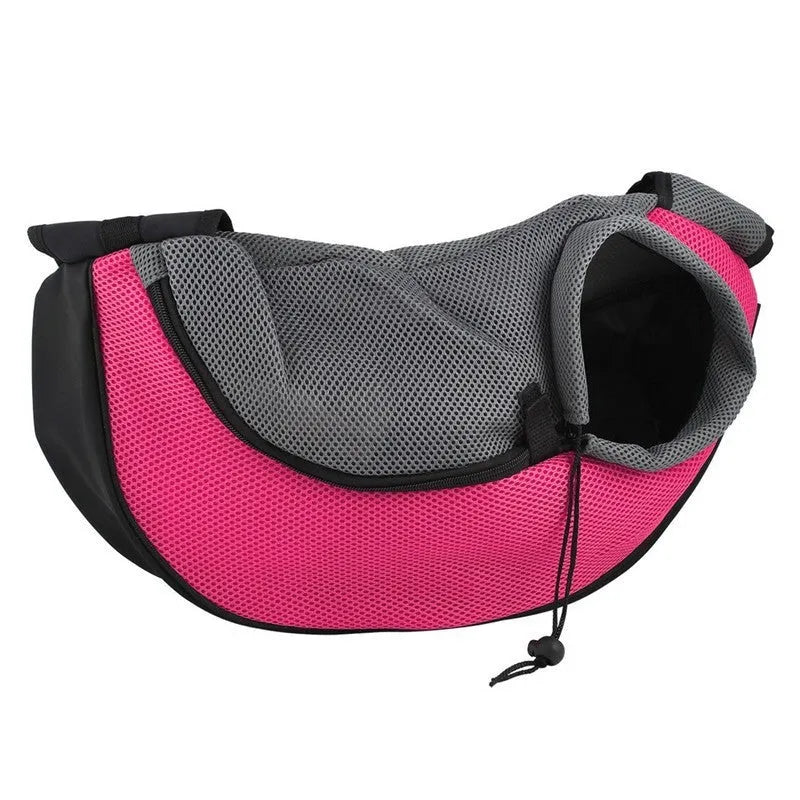 Blue pet carrier backpack for a small dog, showing padded interior and shoulder straps.