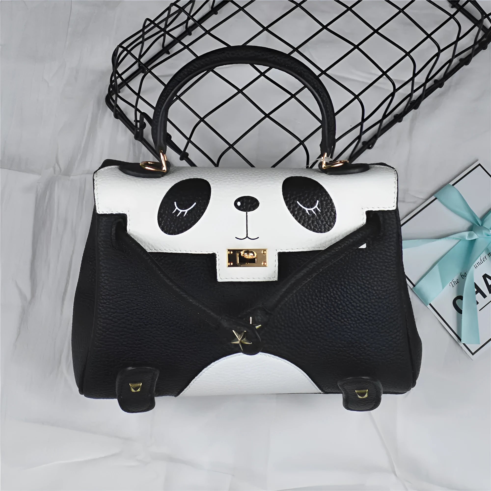 Horizontal square panda print handbag made from brown cowhide leather with sweet lady animal pattern.