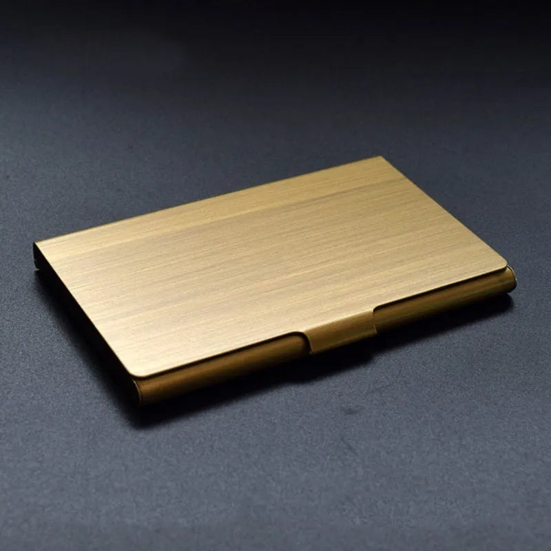Metal titanium business card holder in black finish holding business cards