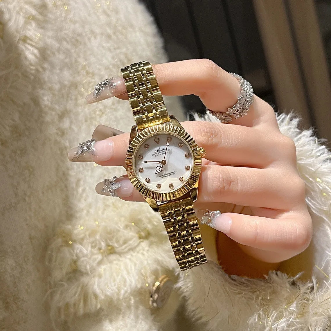 Women's rose shell watch with 7mm thin case, shown with white, red, or black leather strap or steel belt