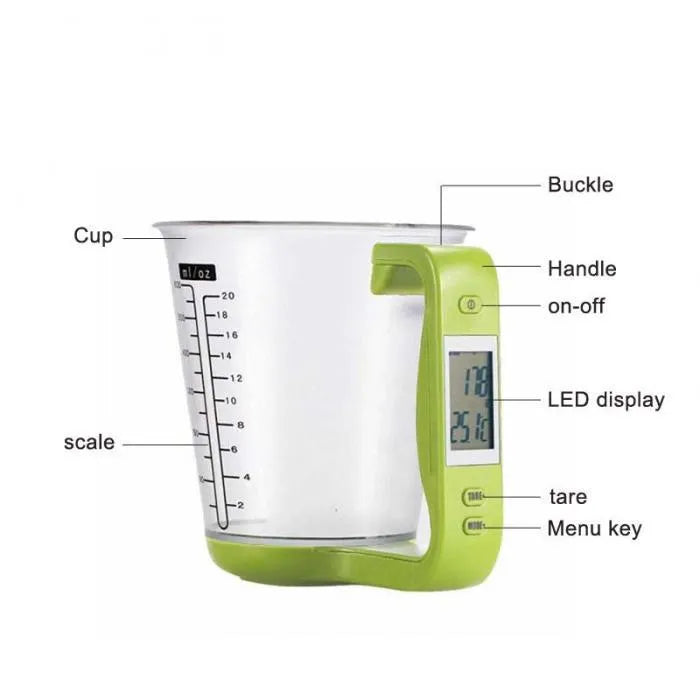 Green digital kitchen scale measuring cup with LCD display in handle on kitchen counter