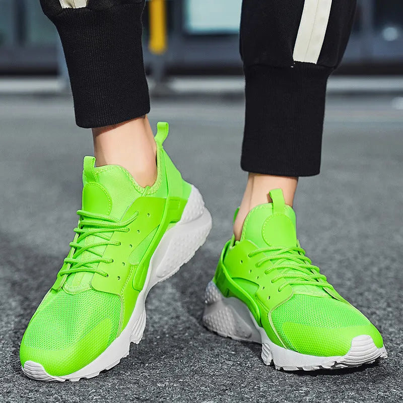 Men's mesh casual shoes with cross shoulder straps in green colour with front lace-up design