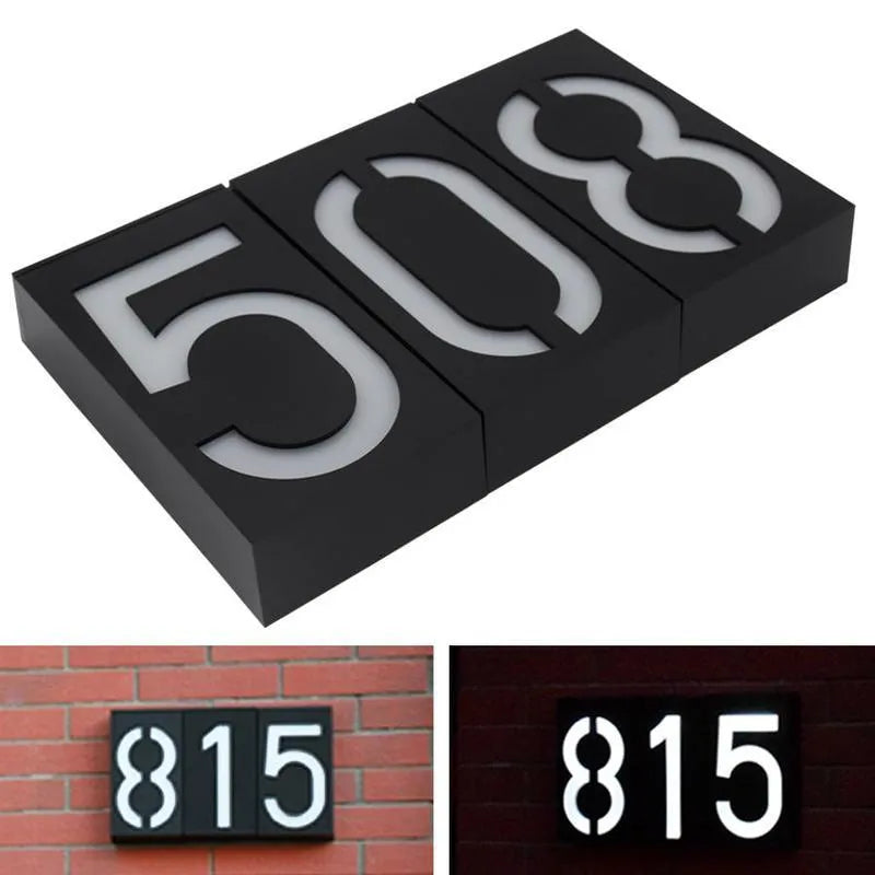 Solar powered house number light with white LED illumination and wall mounting bracket
