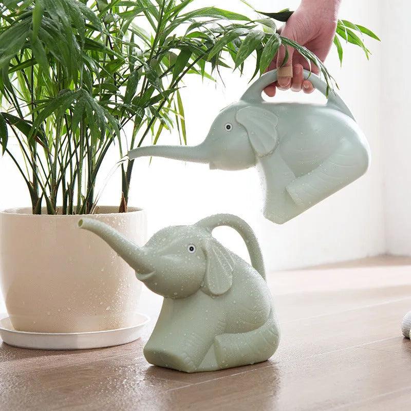 Baby elephant shaped watering can with long nozzle in pink colour for gentle garden watering