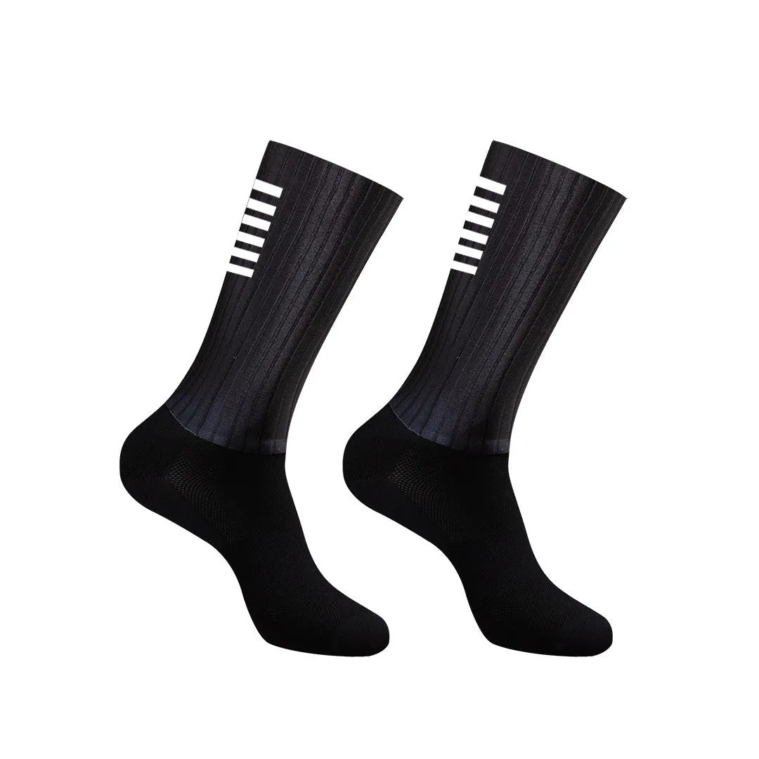 A pair of athletic cycling socks in a chemical fibre blend, shown in one of six available colours on a plain background.