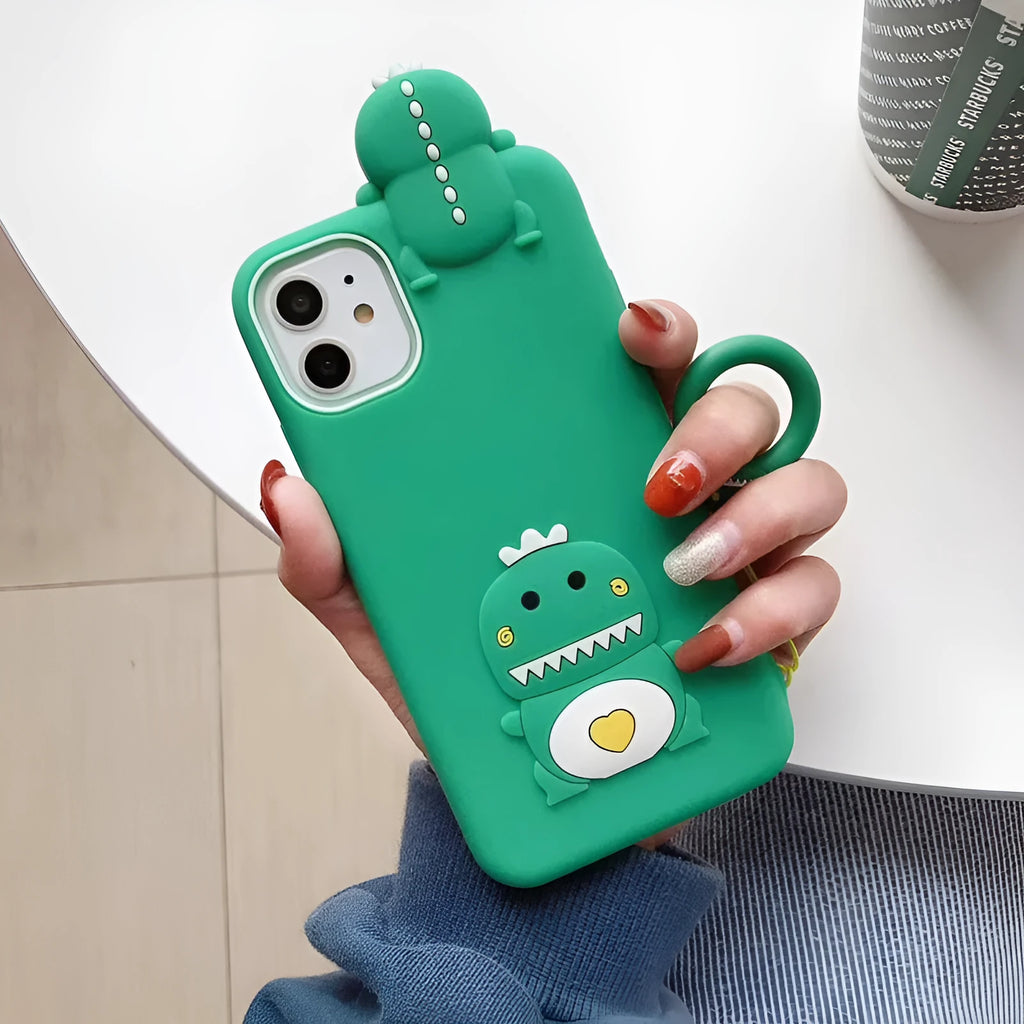 Green and yellow silicone iPhone cases with animal cartoon designs on a white background.