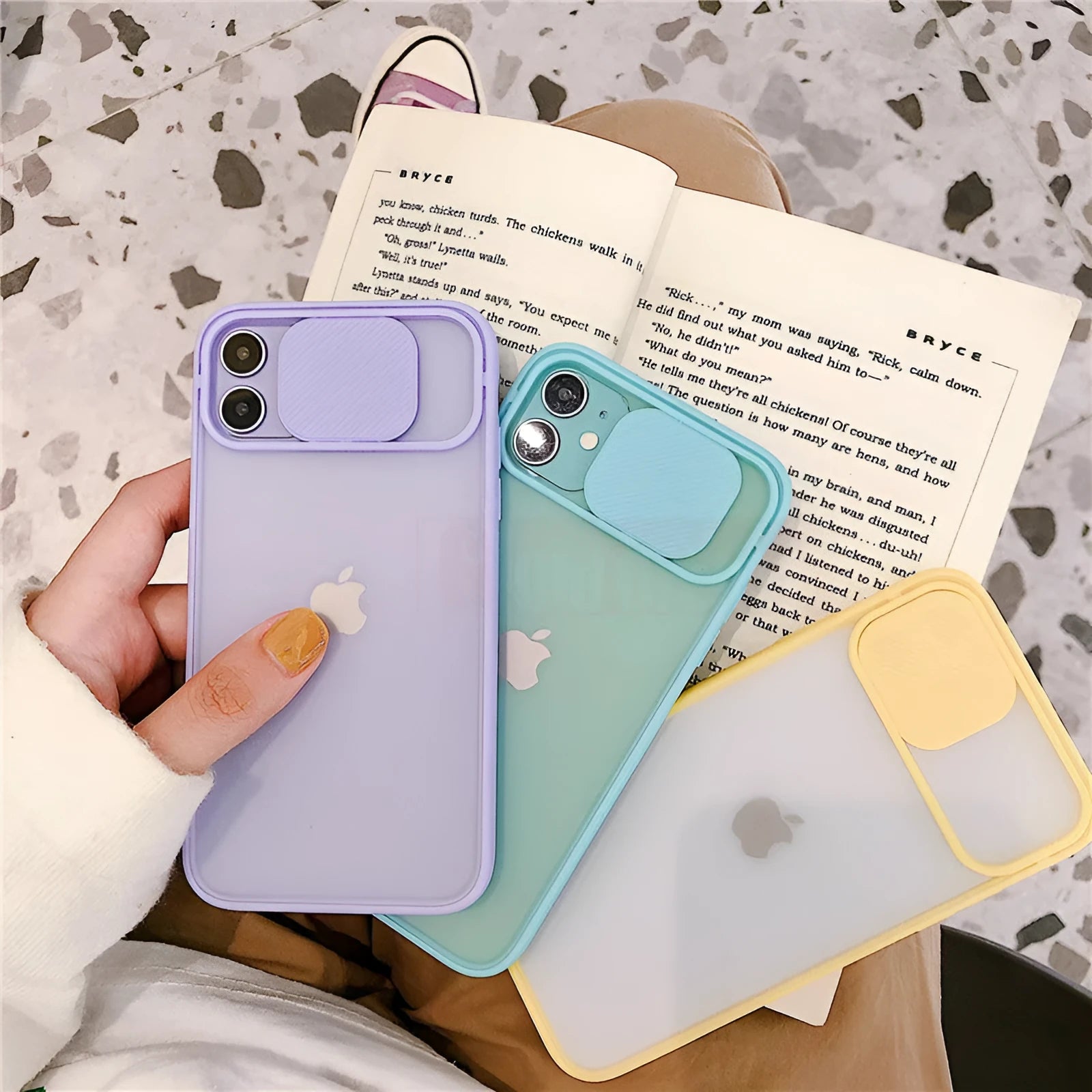 Silicone iPhone case with frosted texture around camera lens in solid colour