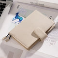 A6 loose-leaf diary with cowhide leather cover showing lychee pattern texture