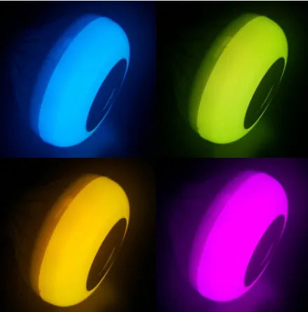 White smart LED bulb with E27 base featuring built-in Bluetooth speaker and 16-colour RGB lighting