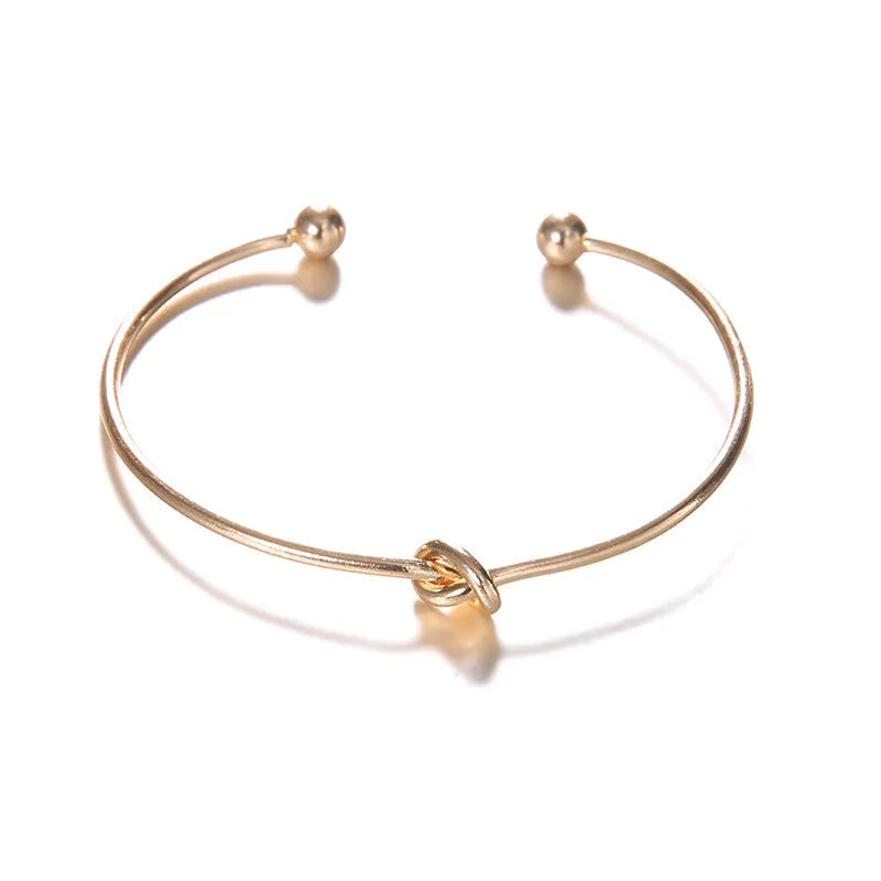 Gold vintage arrow knotted cuff bracelet for women with European American style design