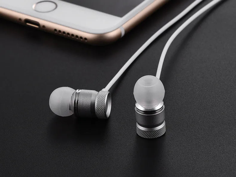 In-ear headphones with TPE cable in black, gold, pink or silver colours showing 10mm drivers