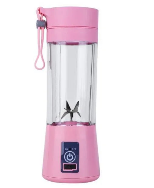 Mini USB-powered centrifugal fruit juicer in pink, with a 400ml plastic cup and stainless steel blade.