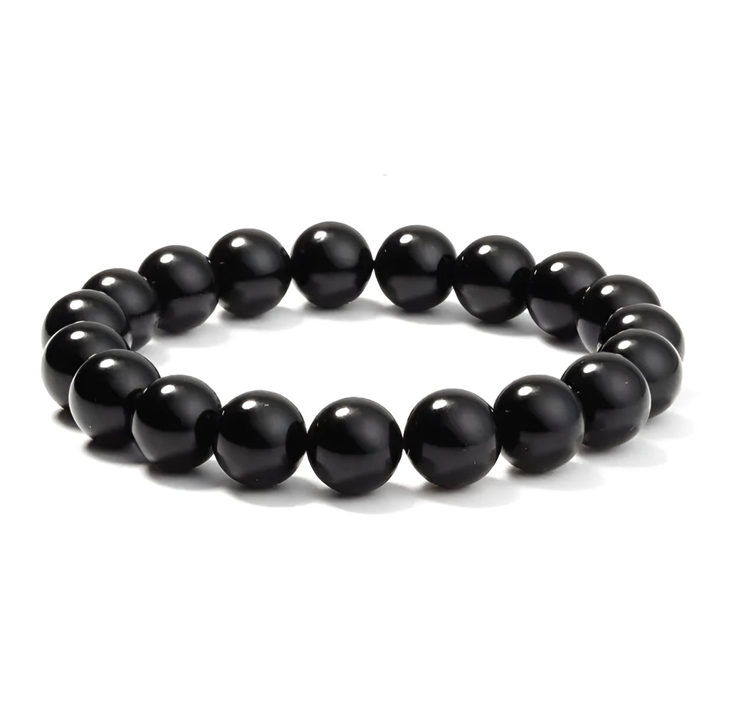 Geometric black onyx stretch bracelet with 8mm agate beads on an elastic cord.