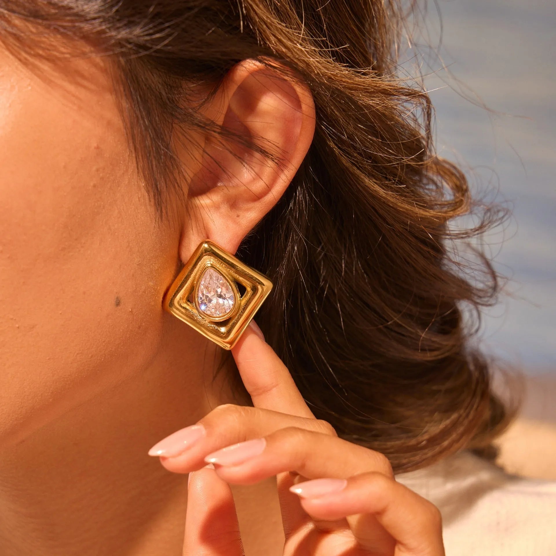 Geometric water drop zircon stud earrings in stainless steel with gold electroplating