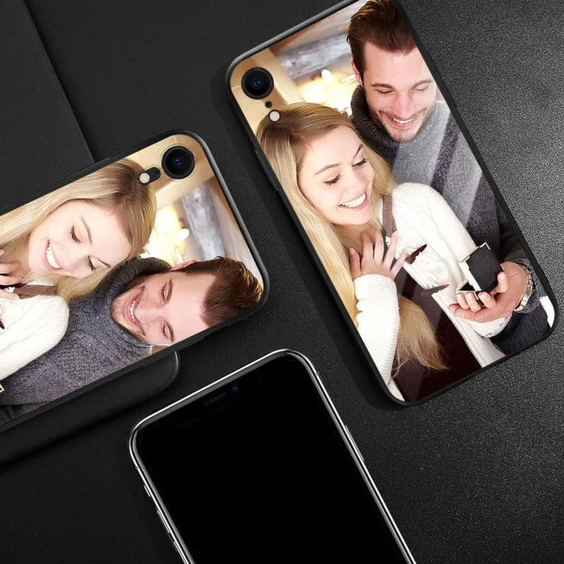 Patterned ultra-thin iPhone case with raised camera bumper edge on a table.