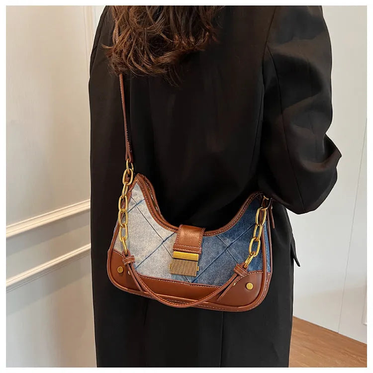 Brown denim women's shoulder bag with diamond chain detail and bucket shape