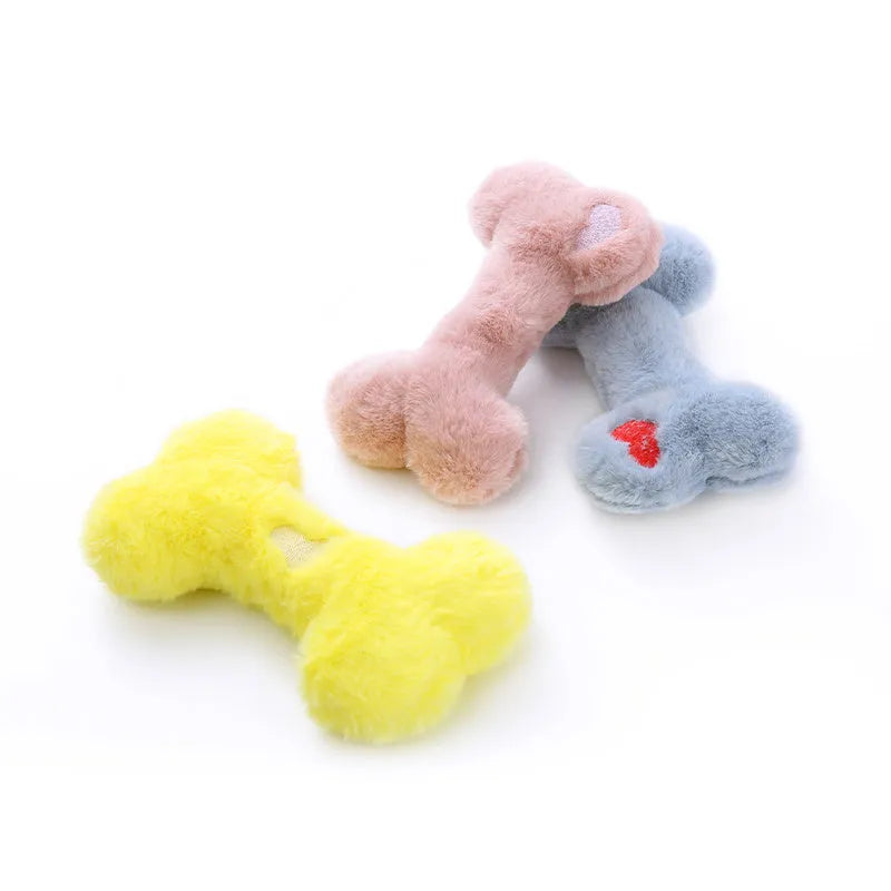 Plush love bone dog toy with squeaker in blue, pink, or yellow colours for interactive play