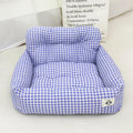 Grey and blue plaid cloth dog bed designed for car travel, shown in small and large sizes.