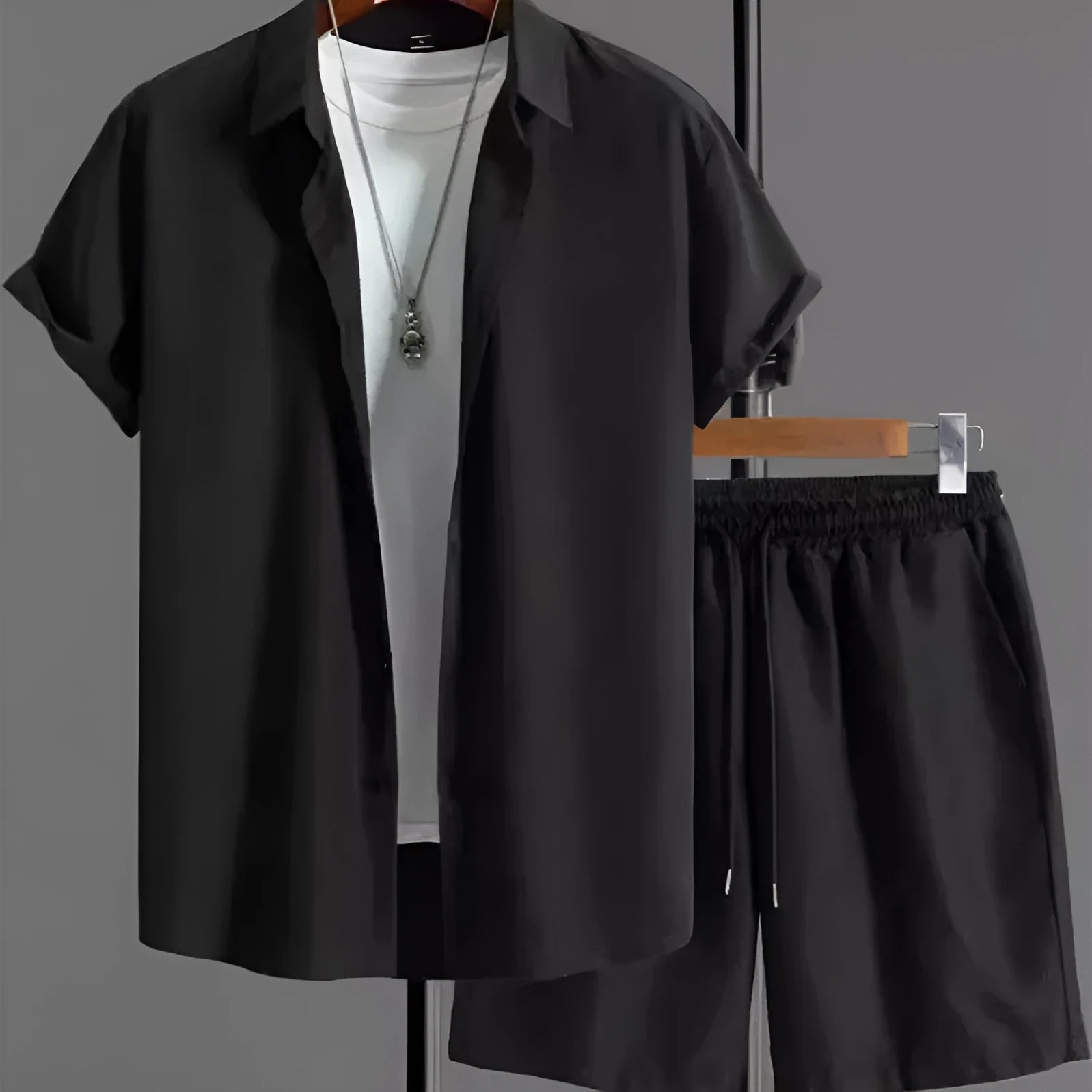 Short sleeve jacquard suit set with shorts in solid colour on a hanger