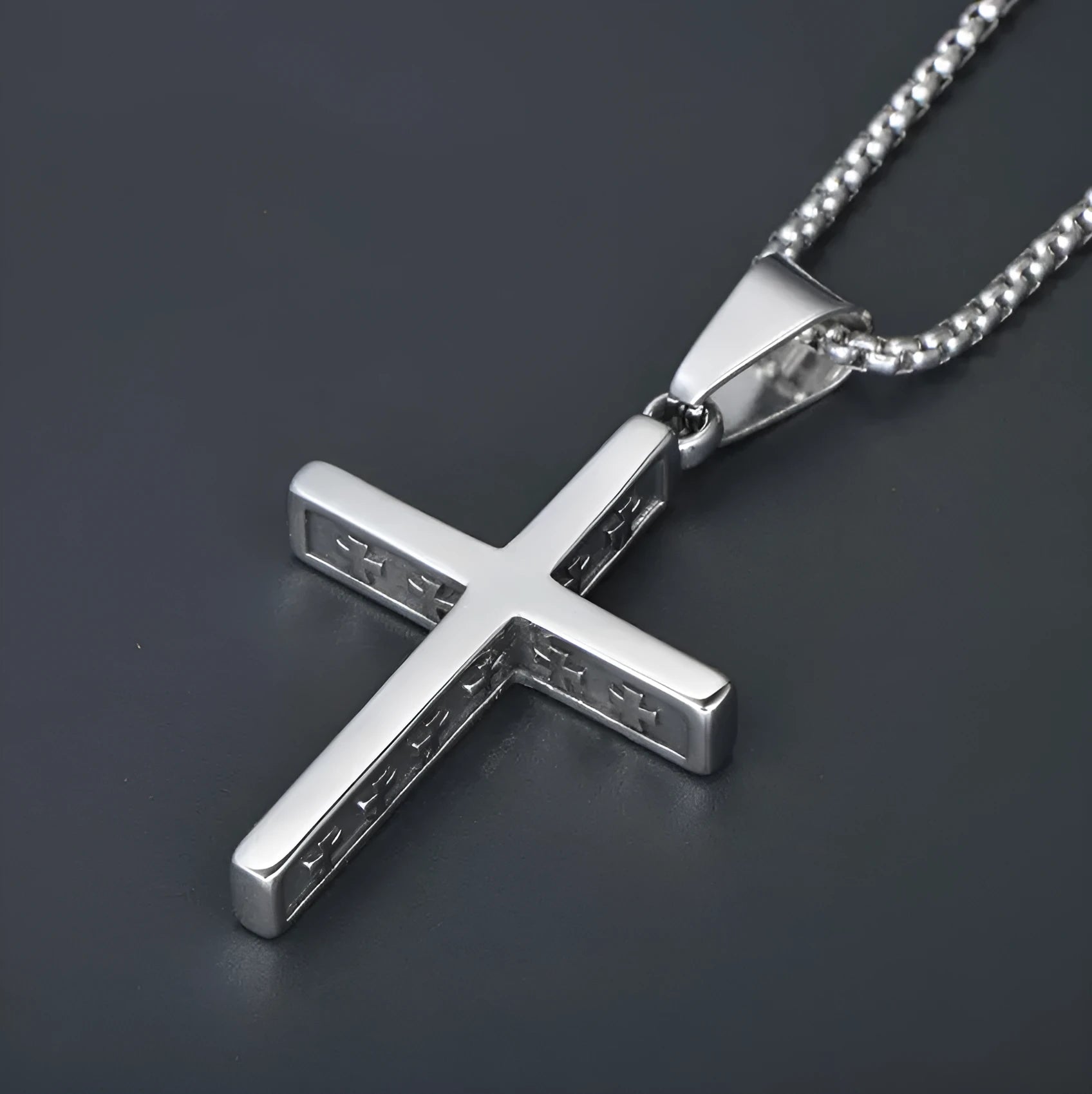 Unisex titanium steel stainless steel necklace with bowknot pendant and pearl chain on display