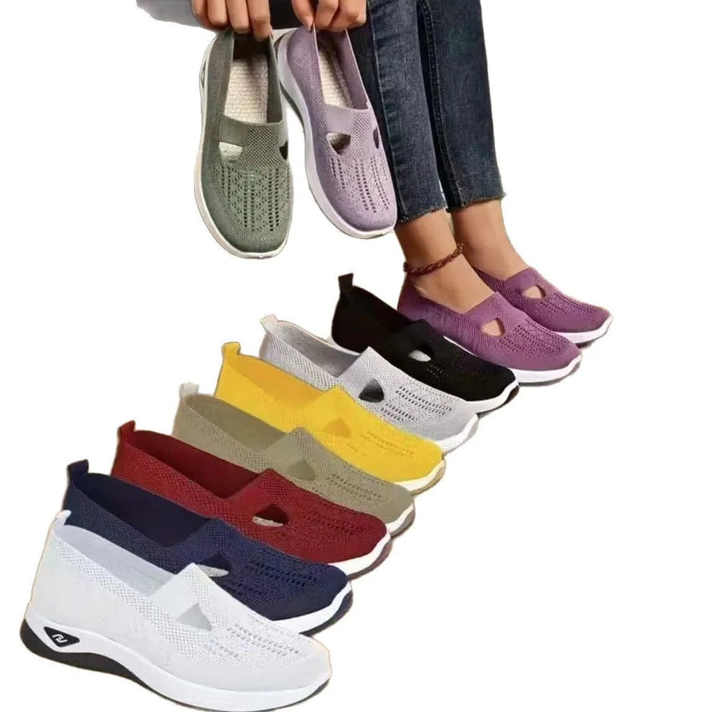 Women's casual flat mesh shoes with T-strap in assorted colours on soft PVC sole