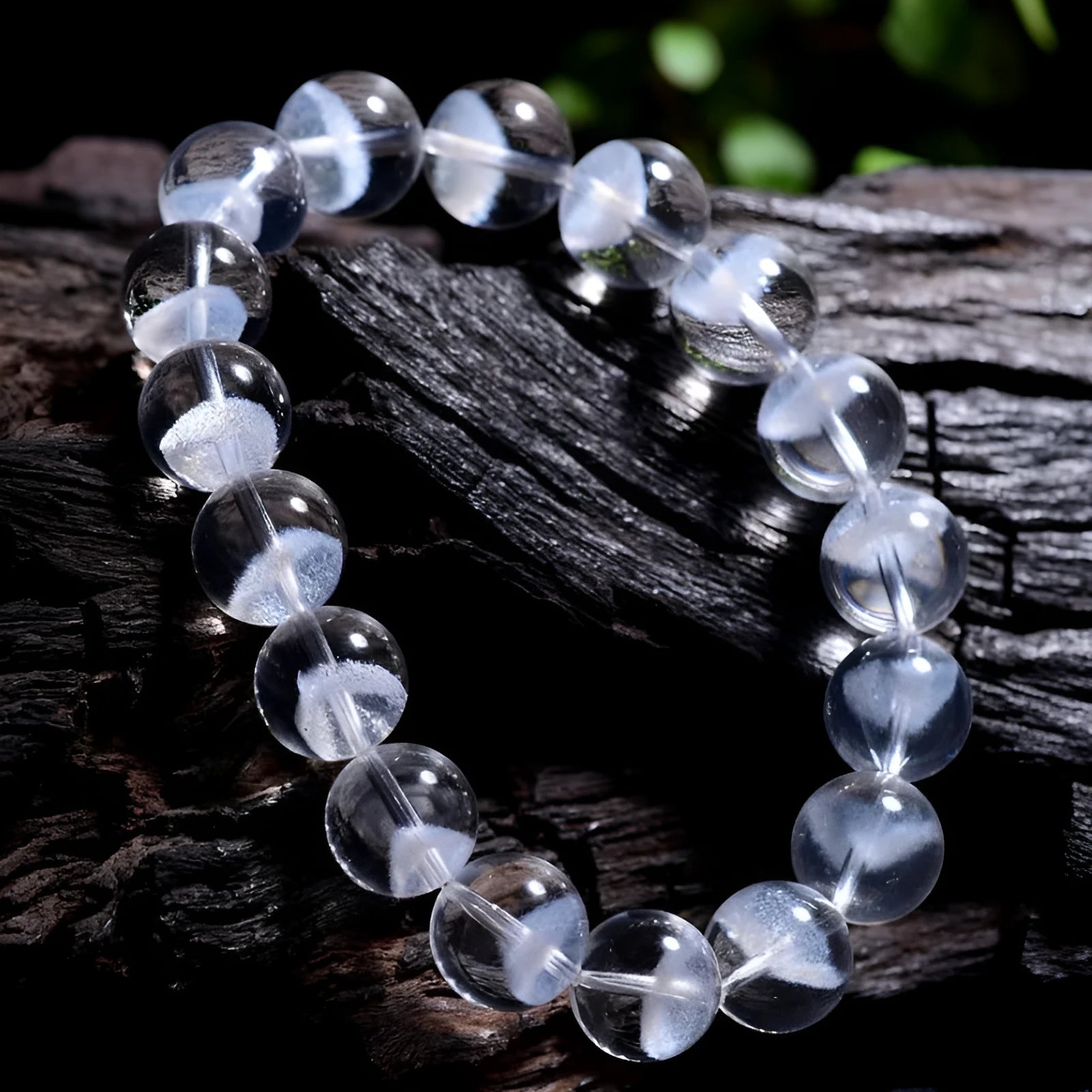 Women's original white crystal pyramid bracelet with ruyi charm, showing polished beads.