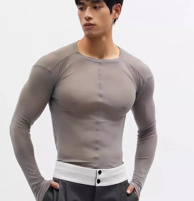 Black slim-fit long sleeve pullover top with mesh see-through texture.