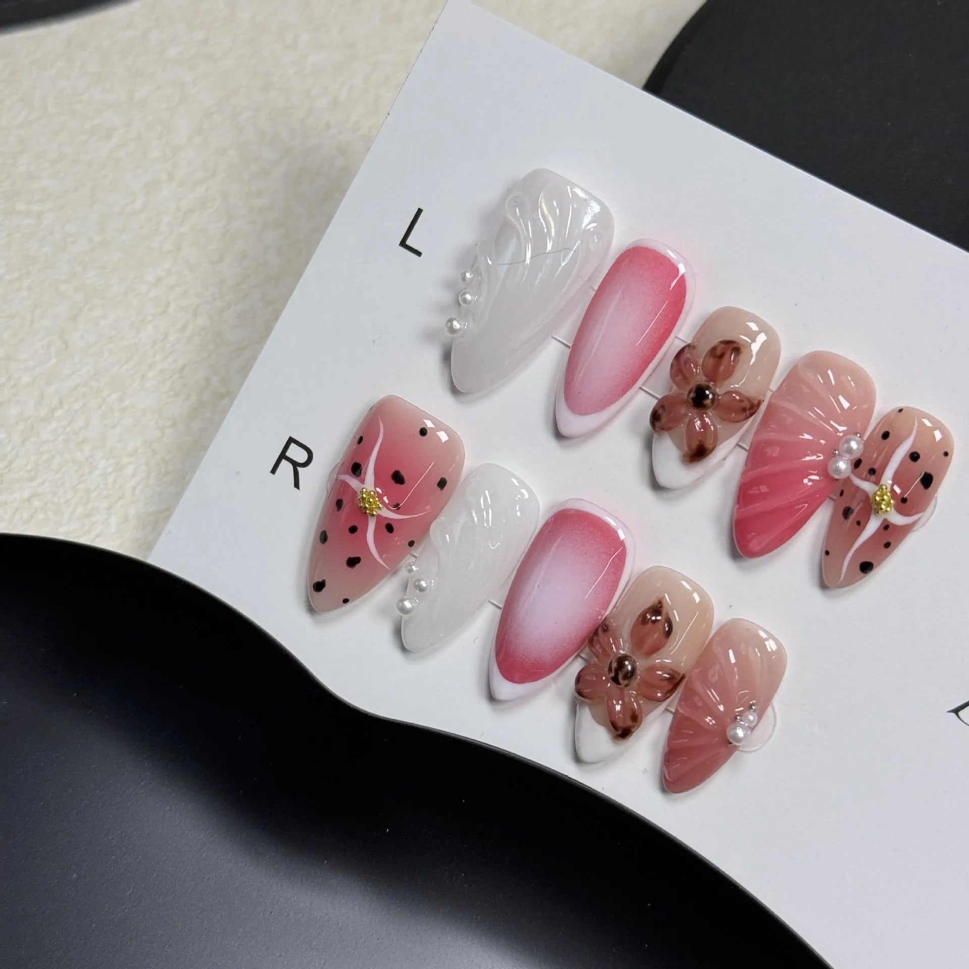 Three-dimensional hand-painted nail art stickers with embossed candy patterns in multiple colours