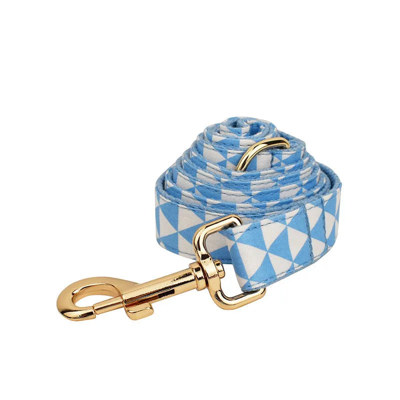 Blue cloth four-piece pet dog set showing collar, leash, bow tie and vest