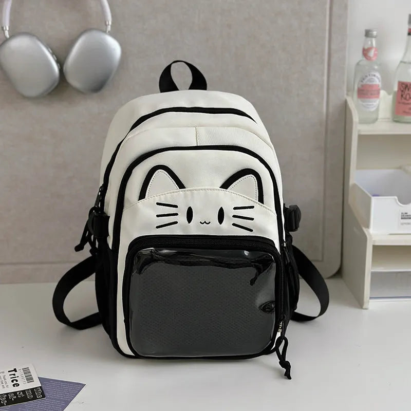 Korean cartoon backpack in multiple colours with curved shoulder straps and badge pendant options
