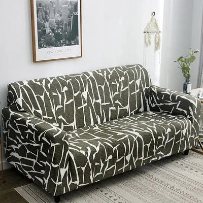 Geometric patterned stretch sofa slipcover fitted on a three-seater sofa